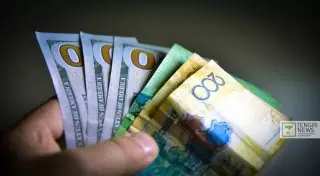 Тенге продолжает слабеть