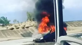 Автомобиль горел на трассе в Алматинской области