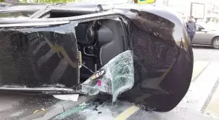 Nissan Qashqai перевернулся от удара "легковушки" в Алматы