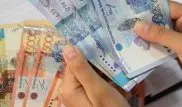 Казахстанцы должны банкам по 3 зарплаты - исследование