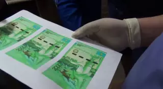 За подделку купюр номиналом 2000 тенге осудили алматинцев