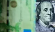 Тенге ослаб до 350 за доллар