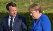 Макрон отказался от выступления с Меркель в Мюнхене