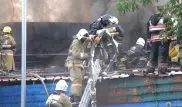 Семь часов тушили склад в Алматы