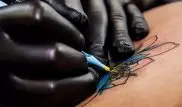 Новую опасность татуировок выявили ученые