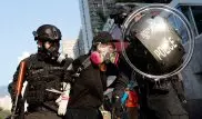 Столкновения в Гонконге: полиция применила боевое оружие