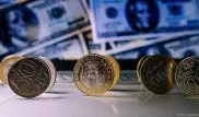 Нацбанк может сдержать дальнейшее ослабление тенге - финансисты
