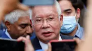 Экс-премьер Малайзии получил 12 лет тюрьмы