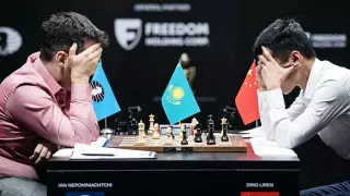 Ян Непомнящий сдался Лижэню в 12-й партии матча за шахматную корону в Астане