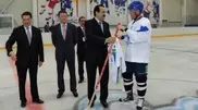 Barys presented Massimov with personalized hockey form 