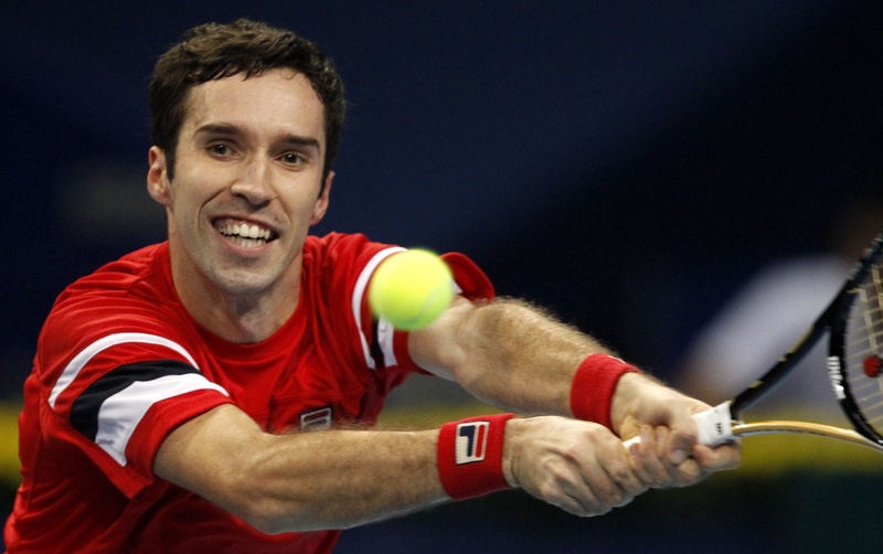 Mikhail Kukushkin of Kazakhstan returns the ball during his quarter final match against Japan's Kei Nishikori at the Swiss Indoors ATP tennis tournament in Basel. ©Reuters