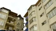 Multi-story building for state workers falling apart in Almaty