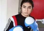 Olympics: Tajik 'million dollar baby' punches way to London 