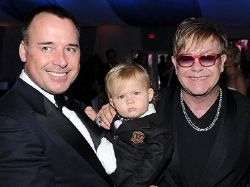 Elton John, his partner David Furnish and their son Zachary. Photo courtesy of femcafe.com