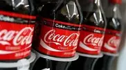 New York imposes partial ban on huge soda drinks 