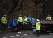 China suspends officials after 11 kids die in road wreck 