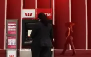Aussie firefighters rescue woman trapped by ATM 