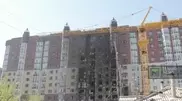 PHOTO: 41 apartments damaged in fire at Bereke residential complex in Astana 