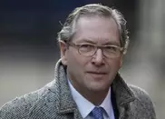 New UK Times editor raises Murdoch titles merger prospect 