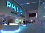 Philips returns to profit, sells entertainment business 