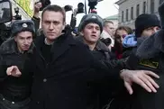 Russia puts Putin critic Navalny on trial 
