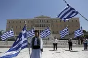 Greece adopts bill to cut 15,000 civil servant jobs 