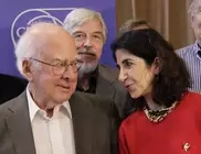 Higgs evidence mounts one year on, so too the suspense 