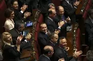Berlusconi's party MPs threaten mass resignation if he is expelled