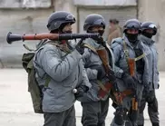 NATO soldier killed in Afghan multiple suicide attack