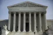 US top court rules domestic abusers can't own guns