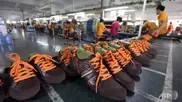 Thousands of workers strike at China shoe factory
