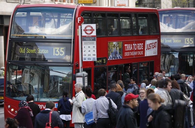 A bus waits at a bus-stop during rush hour outside Liverpool Street station in London. ©Reuters/Luke MacGregor