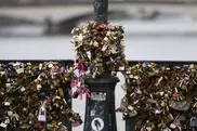 'Locks of love' bridge in Paris evacuated after railing collapse