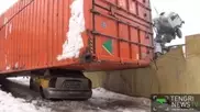 Crane drops 40-ton container on taxi in Almaty