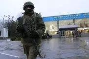 Unidentified armed men seize Crimea airport: report