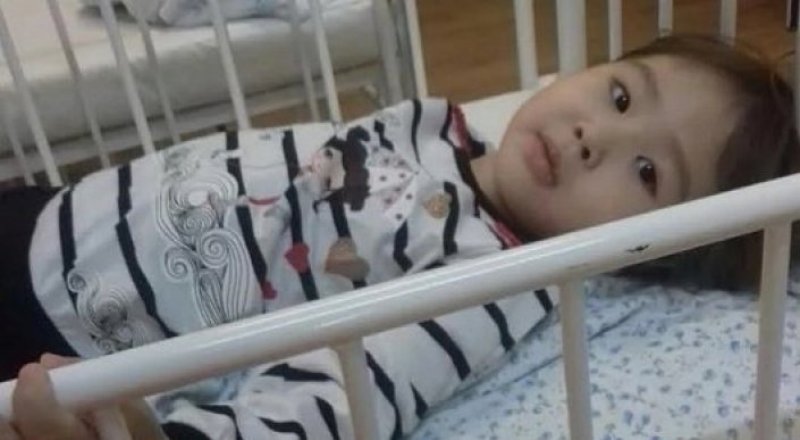 Қайтыс болған екі жасар Сезім. Сурет отбасының жеке қорынан.