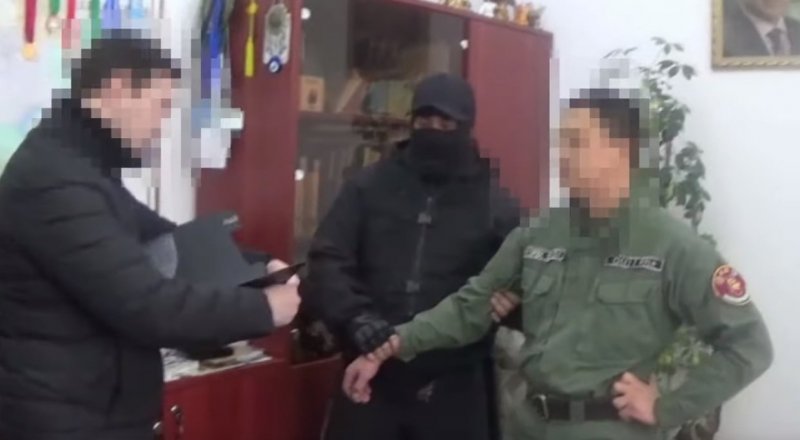 Ұстау сәтінде түсірілген видео кадры