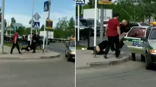 Желідегі видео: күзетшілер шашынан сүйреп көлікке отырғызған адам ер болып шықты