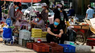 Қытайлық ғалымдар COVID-19 қайдан шыққанын айтты