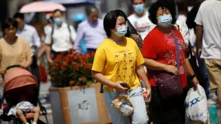 Бейжің тұрғындарына маскасыз жүруге рұқсат етілді