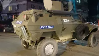 Грузияда банкке жасалған қарақшылық: 43 адам босатылды, қылмыскер қашып кетті