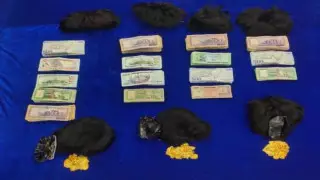 Үндістанда алтын мен ақшаны жасырын алып өтпек болғандар ұсталды