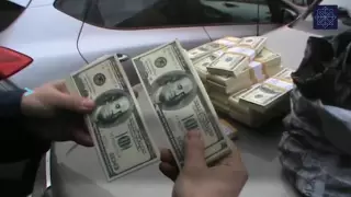 Алматыда миллионға жуық жалған долларды сатпақ болған тұрғын сотталды