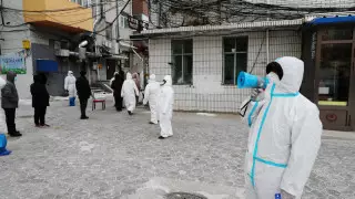 Қытайда COVID-19 жұқтырғандарға 1,5 мың доллардан аса ақша төленеді