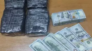 Елден жарты миллион доллар ақша әкетпек болғандар ұсталды