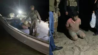 ҰҚК қайықтағы шетелдіктерді ұстау кезінде түсірілген кадрларды көрсетті