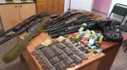 Автомат, мылтық және гранаталар: ҰҚК қару жасырылған қоймалар туралы айтты