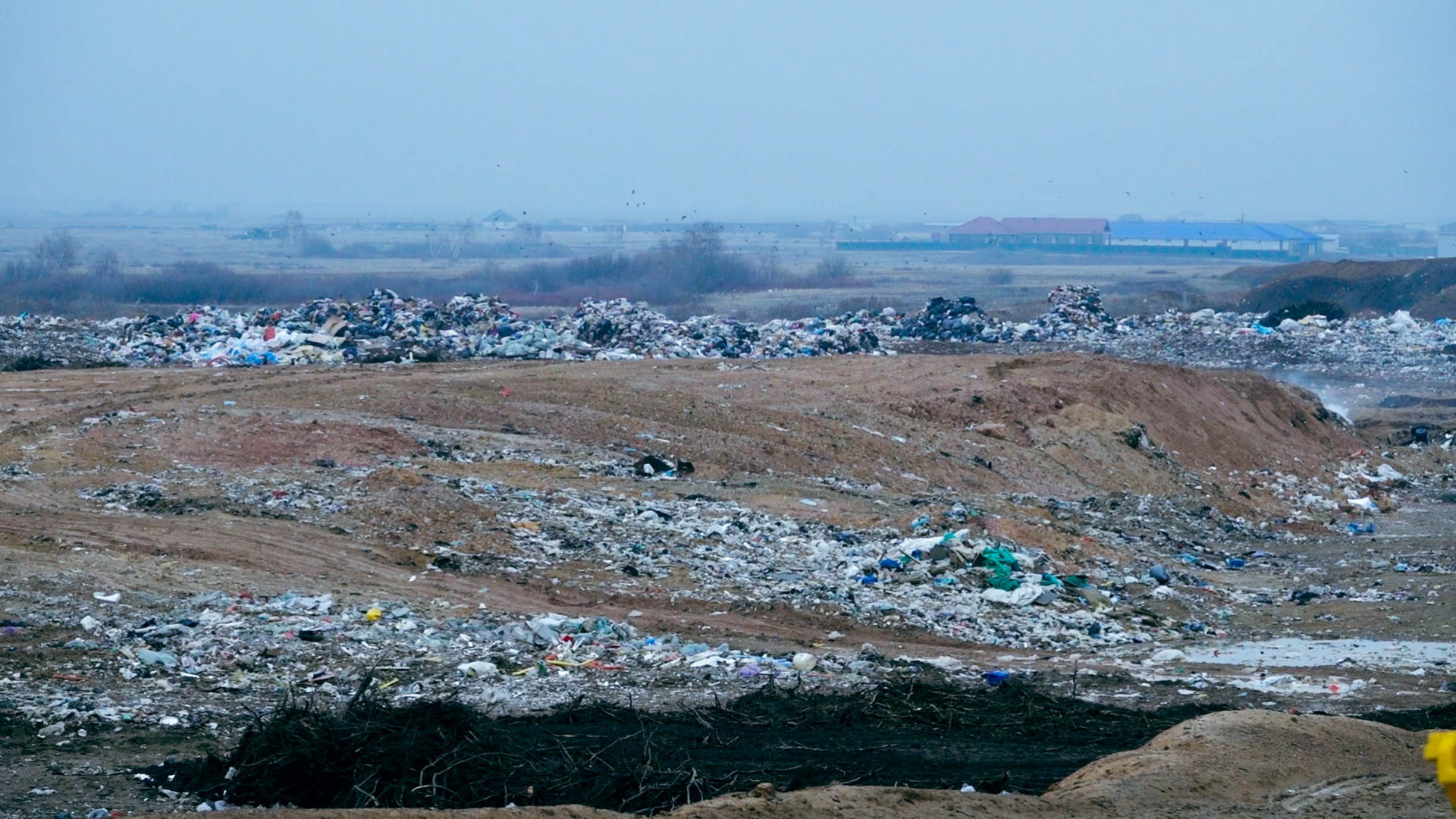 свалка в Коянды